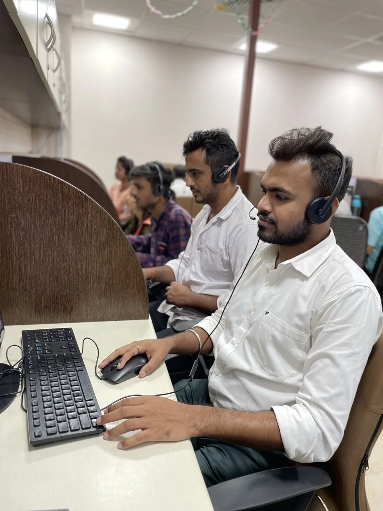 CIPL team members working at customer operations workstations
